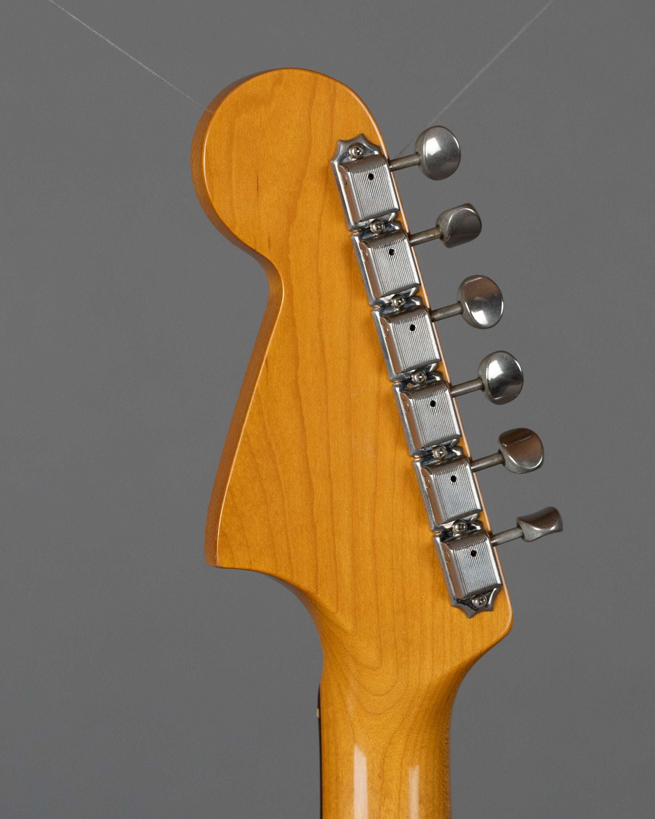 c1999 Fender JG66-85 Jaguar (Japan, Ocean Turquoise Metallic)