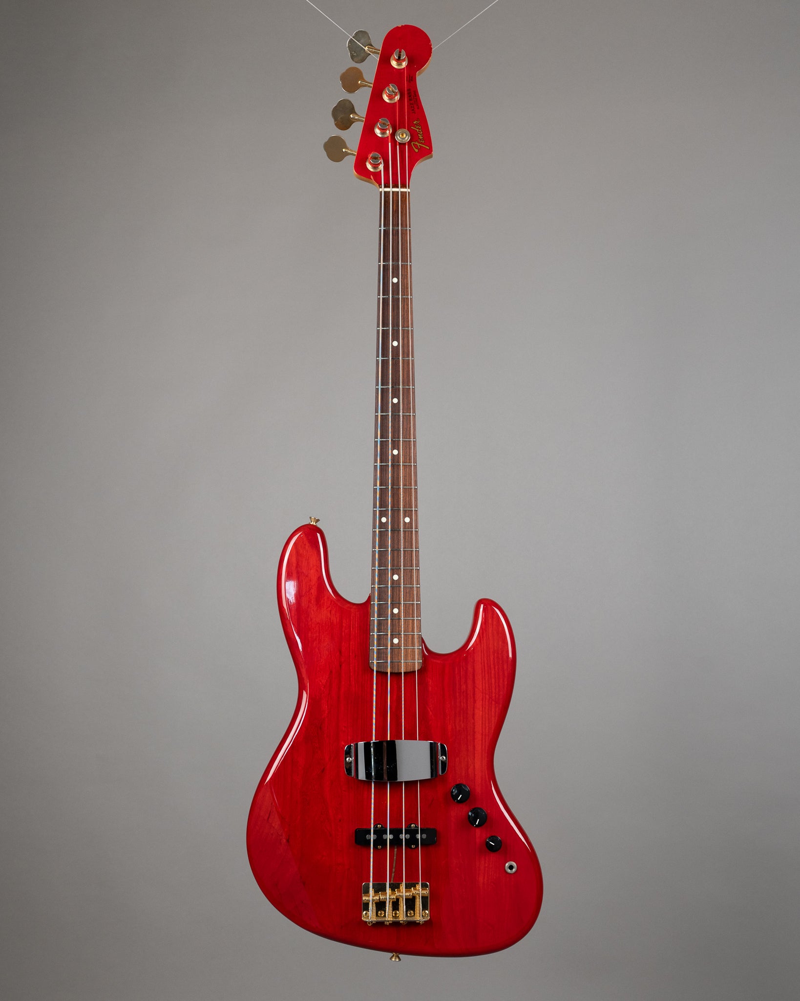 c1984 Fender Jazz Bass 'Custom Order' (Japan, Transparent Cherry)