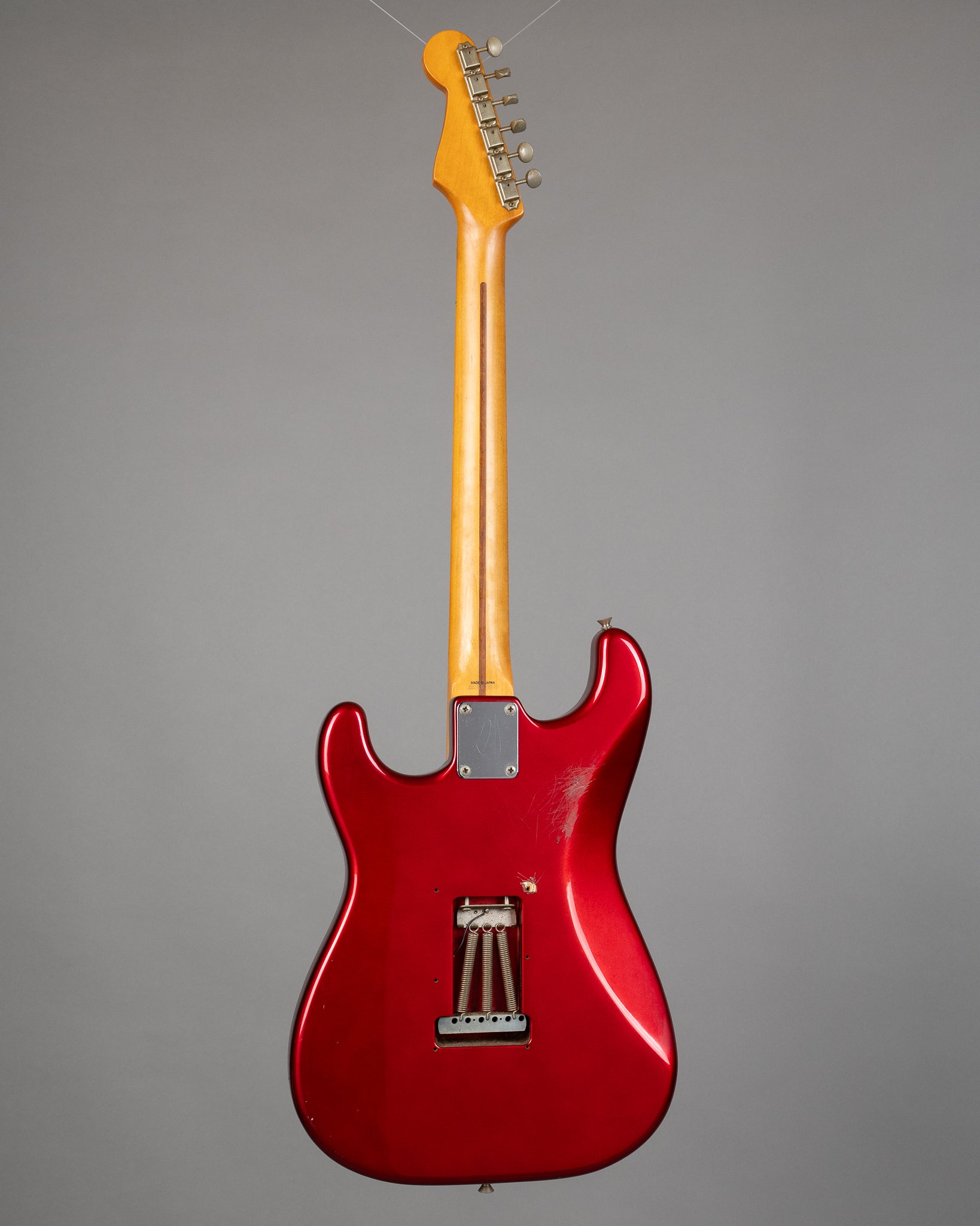 c1990 Fender ST57 Stratocaster (Japan, Candy Apple Red)