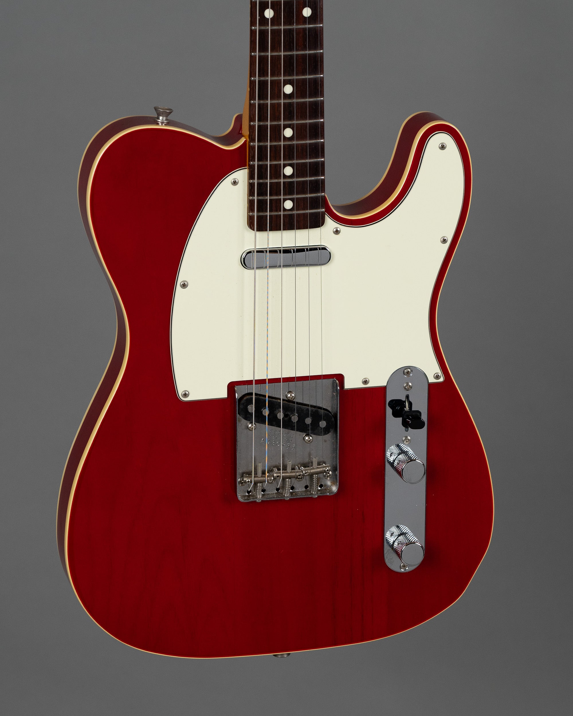 c1997 Fender TL-62B Telecaster (Japan, Transparent Red)