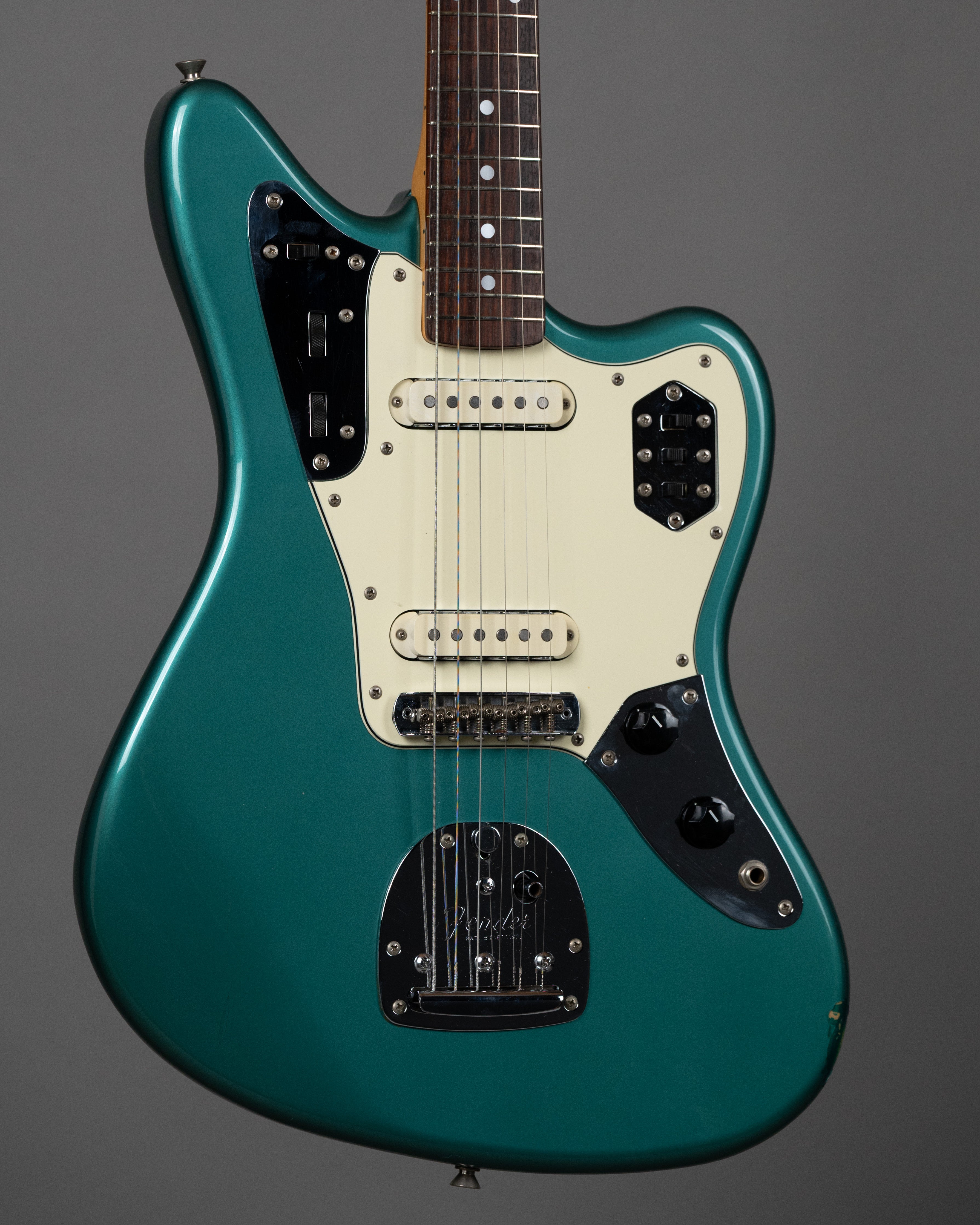 c1999 Fender JG66-85 Jaguar (Japan, Ocean Turquoise Metallic)