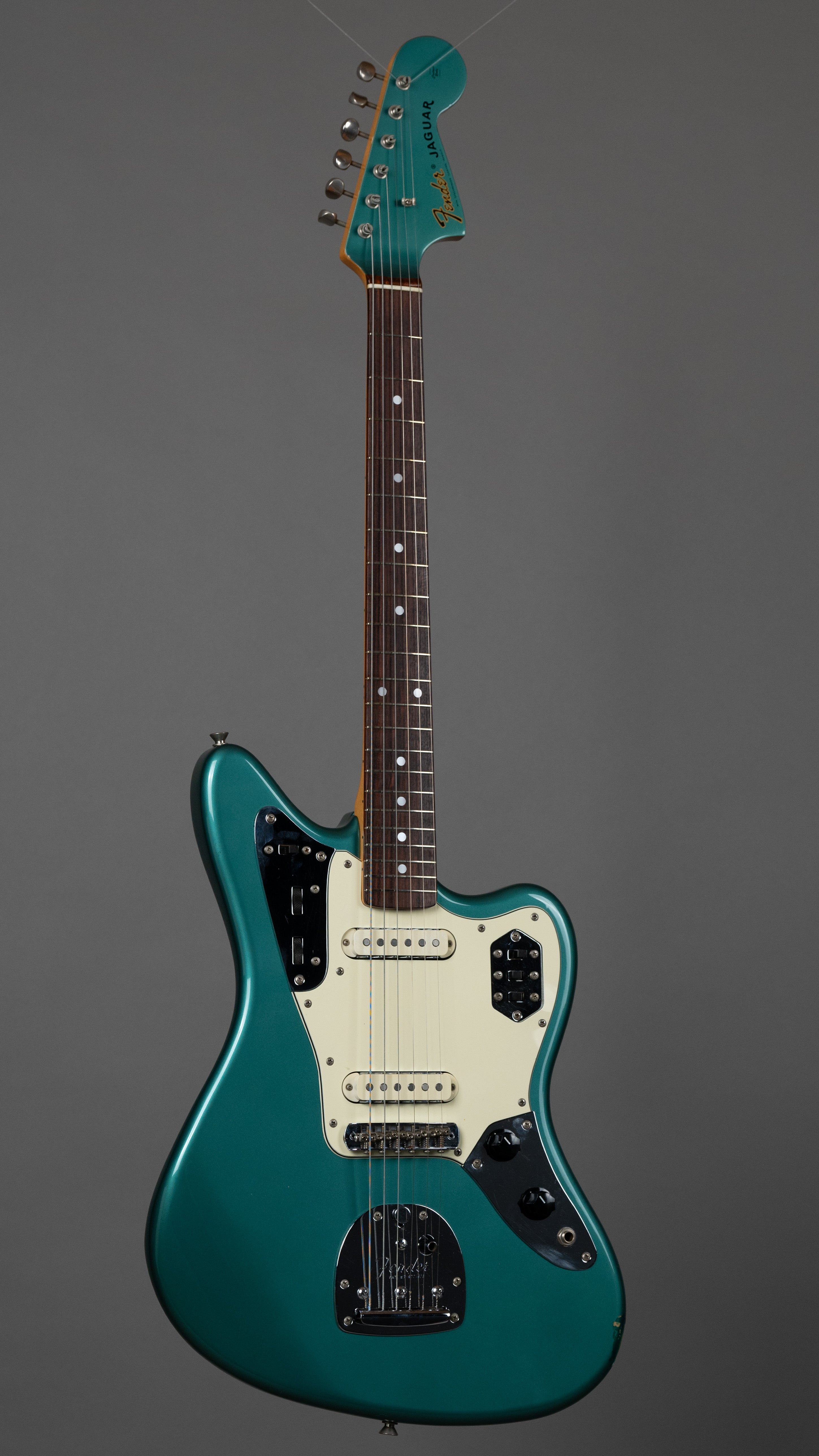 c1999 Fender JG66-85 Jaguar (Japan, Ocean Turquoise Metallic)