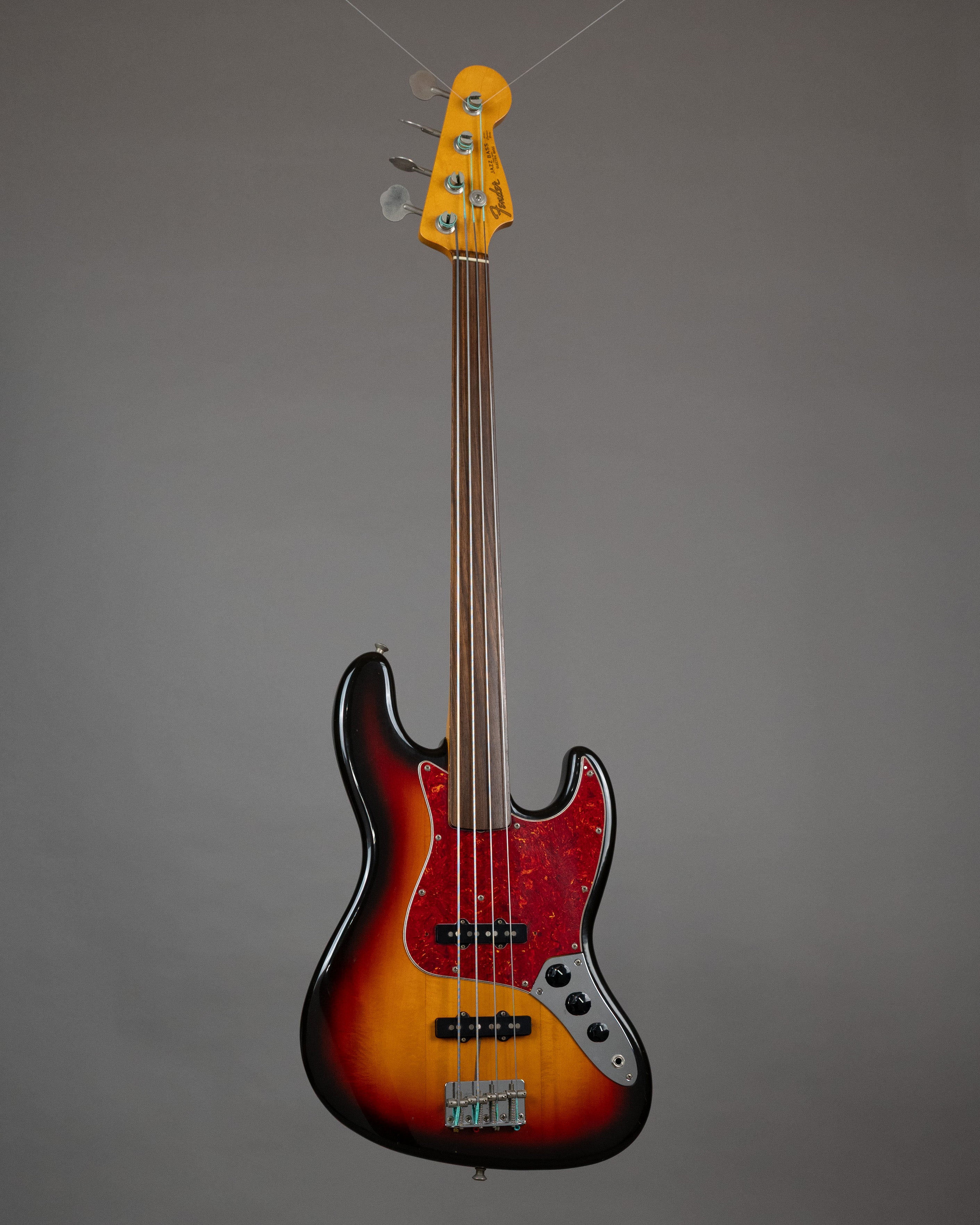 c1989 Fender JB62-60FL Unlined Fretless Jazz Bass (Japan, Sunburst)