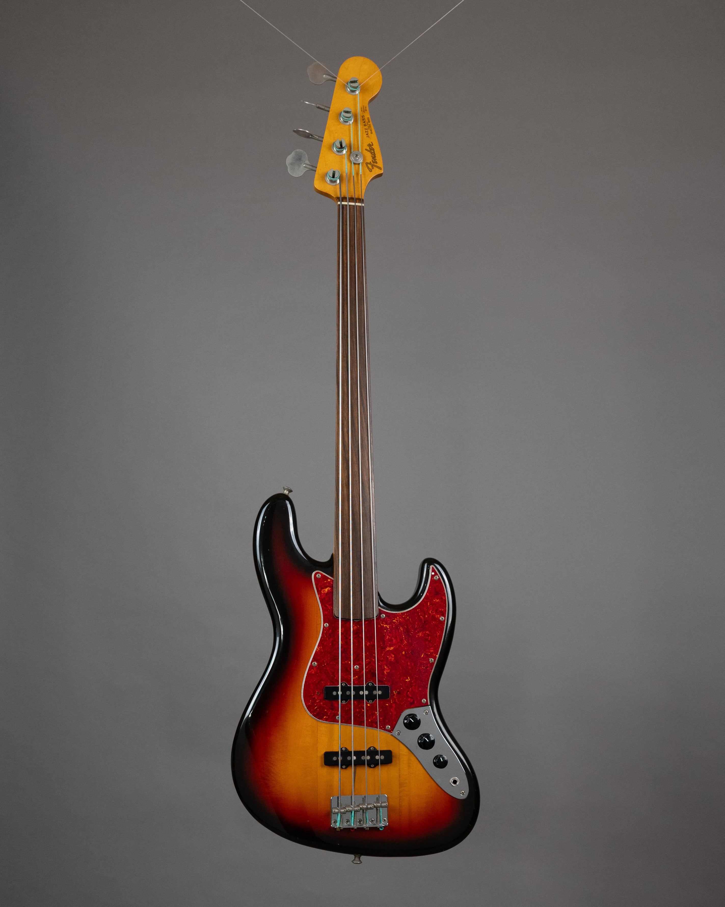 c1989 Fender JB62-60FL Unlined Fretless Jazz Bass (Japan, Sunburst)