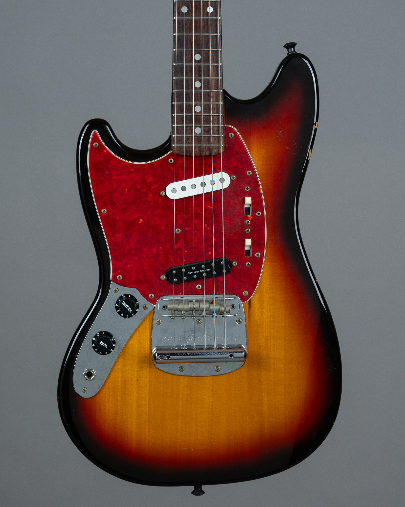 c1994 Fender MG-69 Mustang MOD Left Handed (Japan, Sunburst)