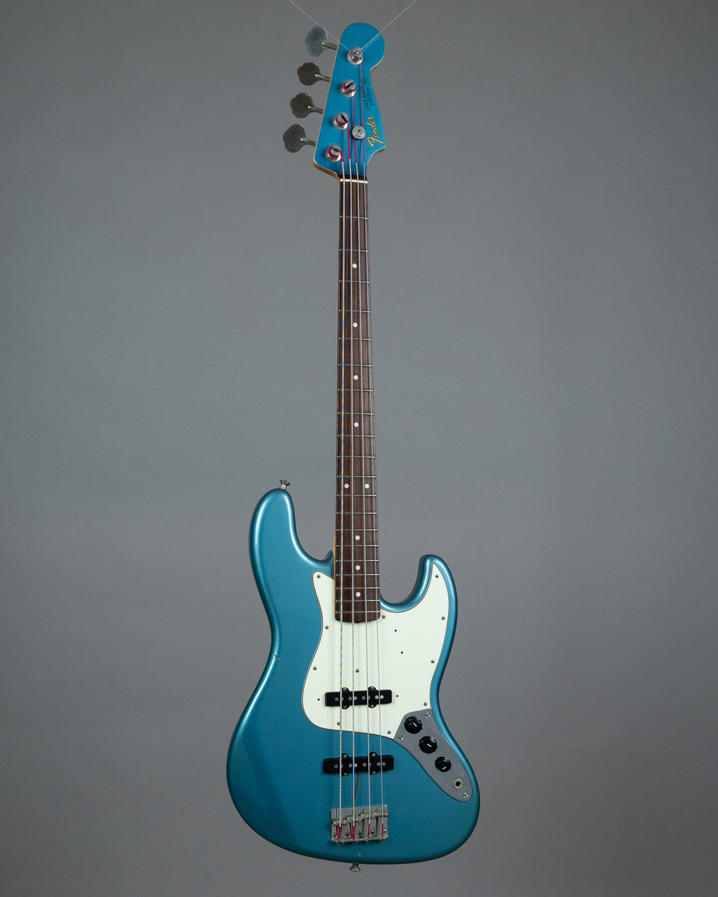 c2007 Fender JB-62 Jazz Bass (Japan, Ocean Turquoise Metallic, Matching Headstock)