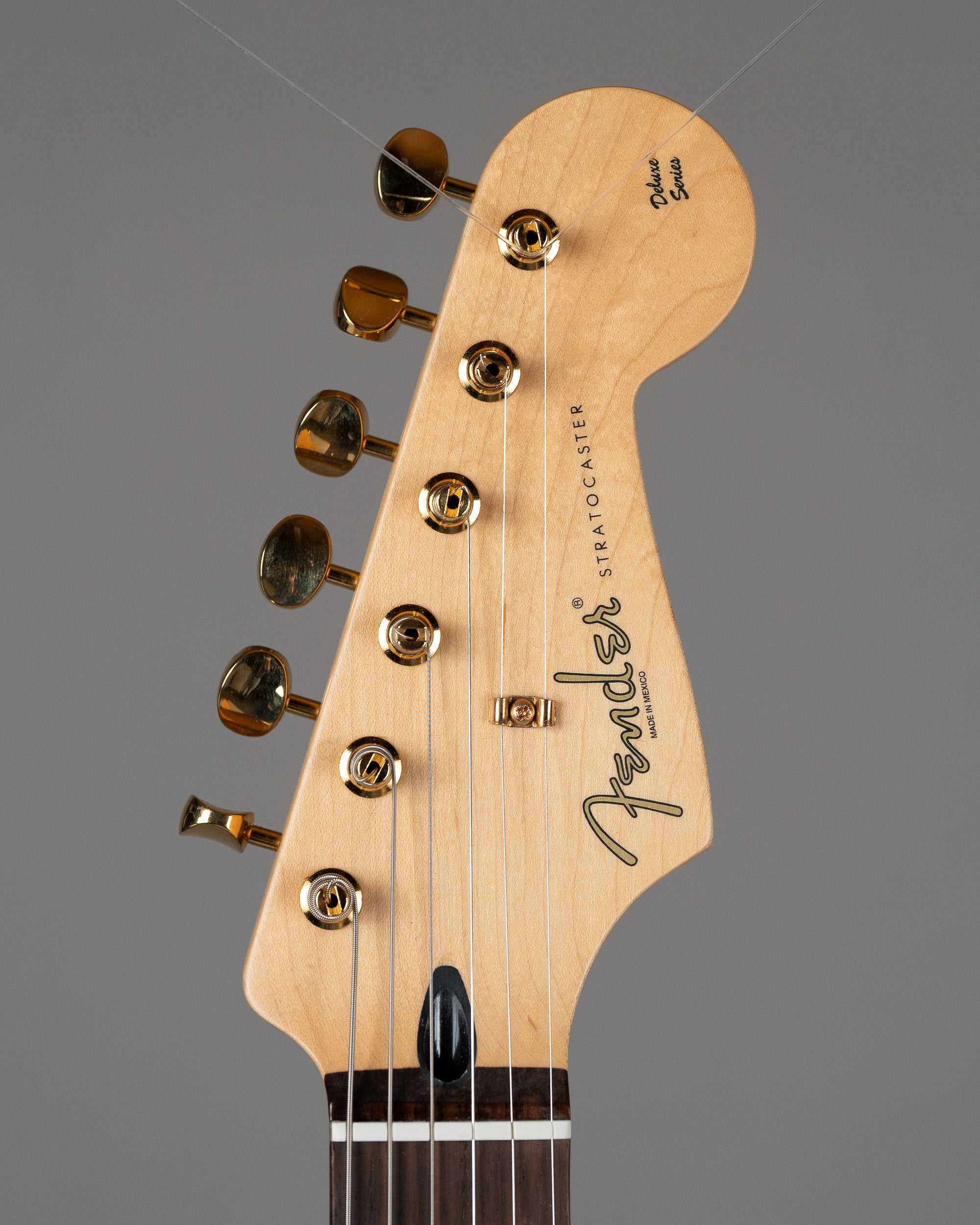 2011 Fender Deluxe Players Stratocaster (Mexico, Crimson Red Transpare