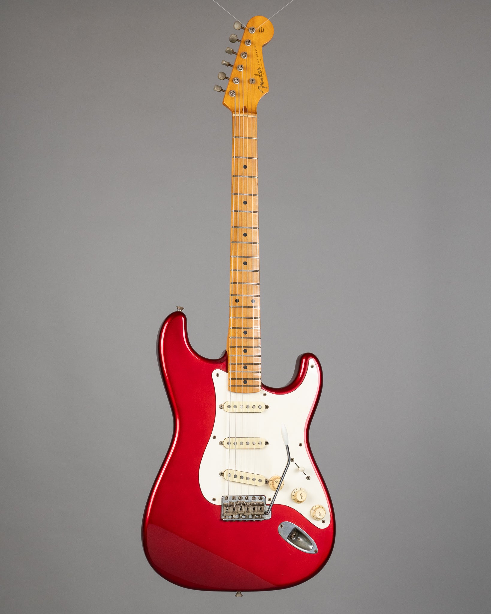 c1990 Fender ST57 Stratocaster (Japan, Candy Apple Red)