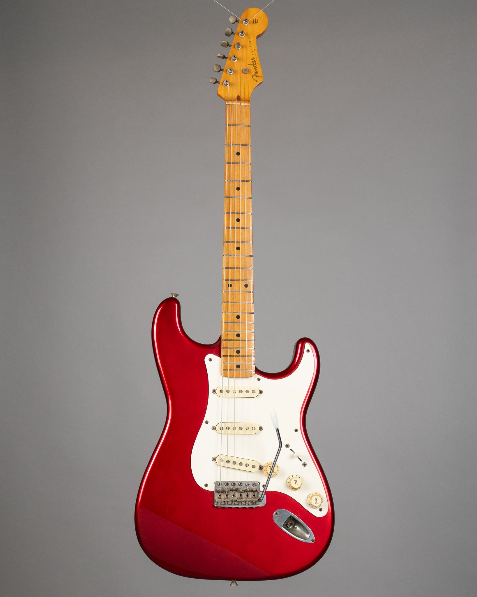 c1990 Fender ST57 Stratocaster (Japan, Candy Apple Red)
