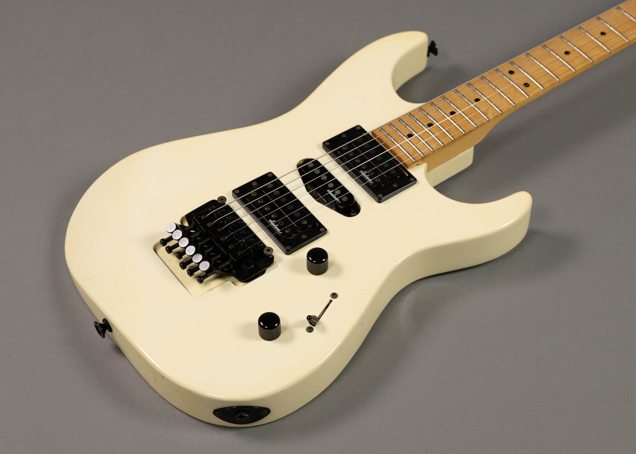 c1989 Charvel Jackson Model HSH Superstrat (Japan, Aged White, Gig Bag)