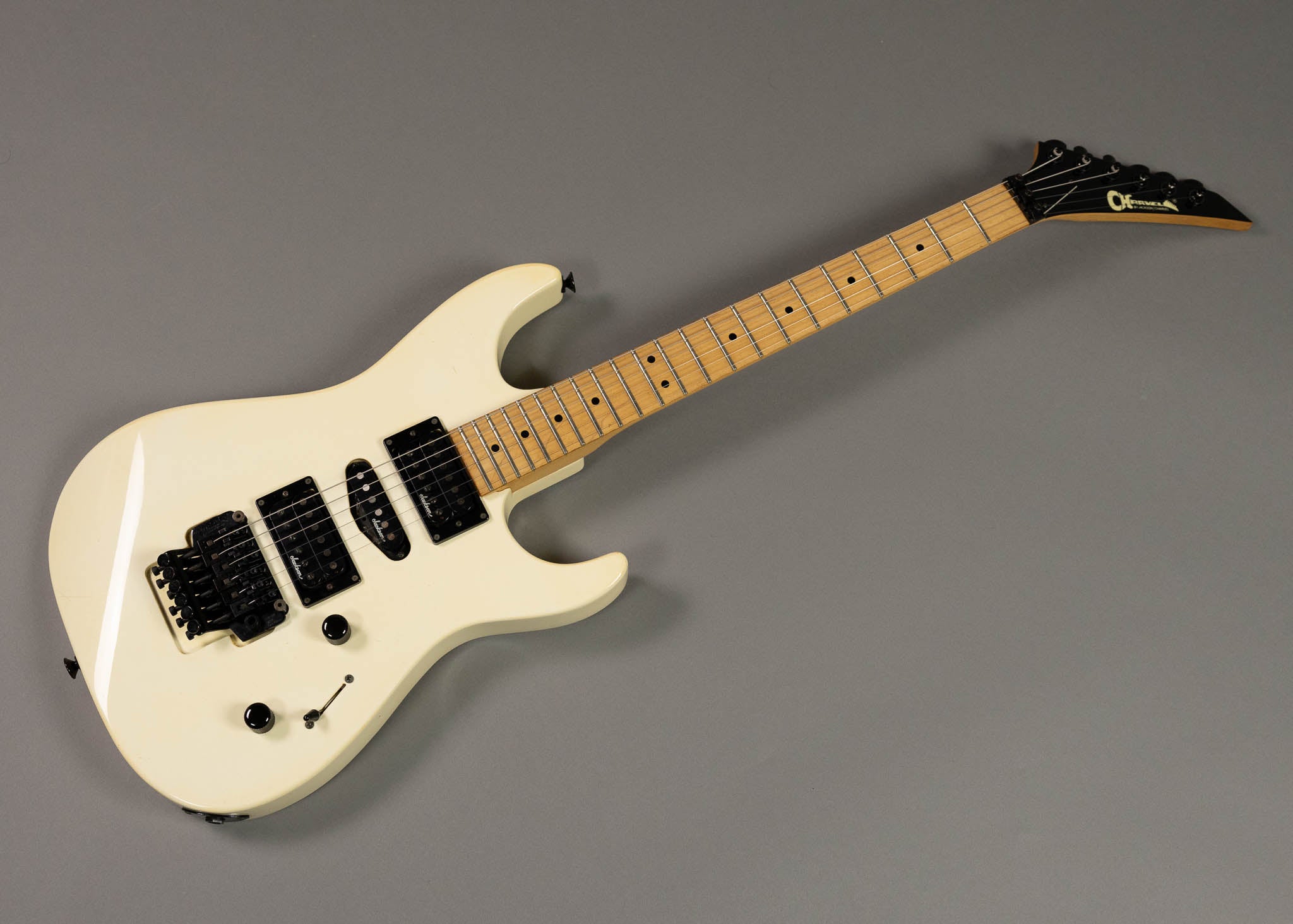 c1989 Charvel Jackson Model HSH Superstrat (Japan, Aged White, Gig Bag)