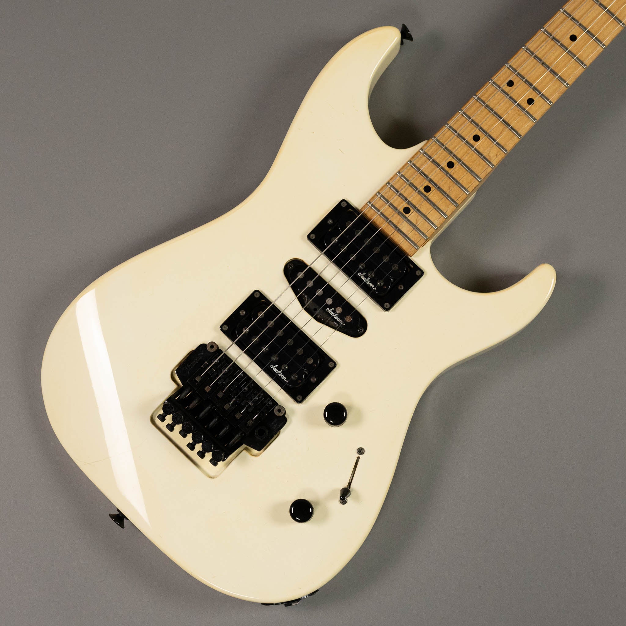 c1989 Charvel Jackson Model HSH Superstrat (Japan, Aged White, Gig Bag)